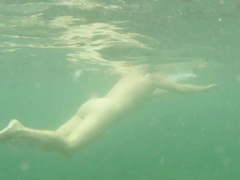 Naked woman underwater 1